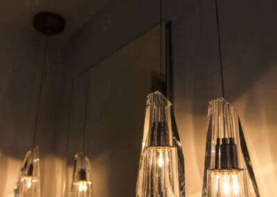 Crystal light bulbs installed in a dark bathroom