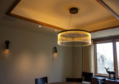 Ring-styled lamps installed over dining room